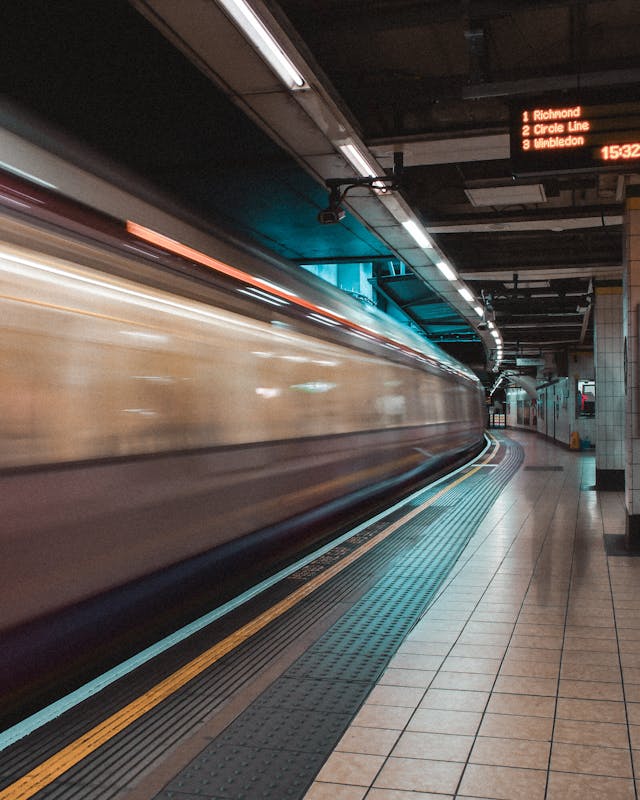 Blurred train passing station